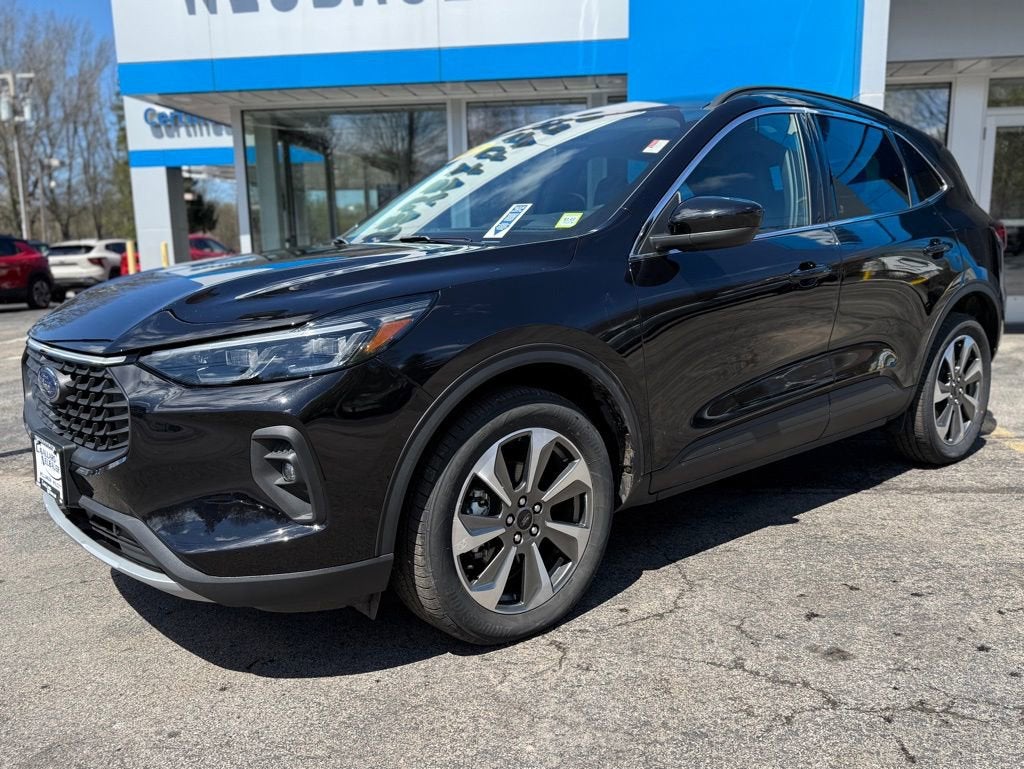 2025 Ford Escape Platinum in Agate Black Metal — front three-quarter view