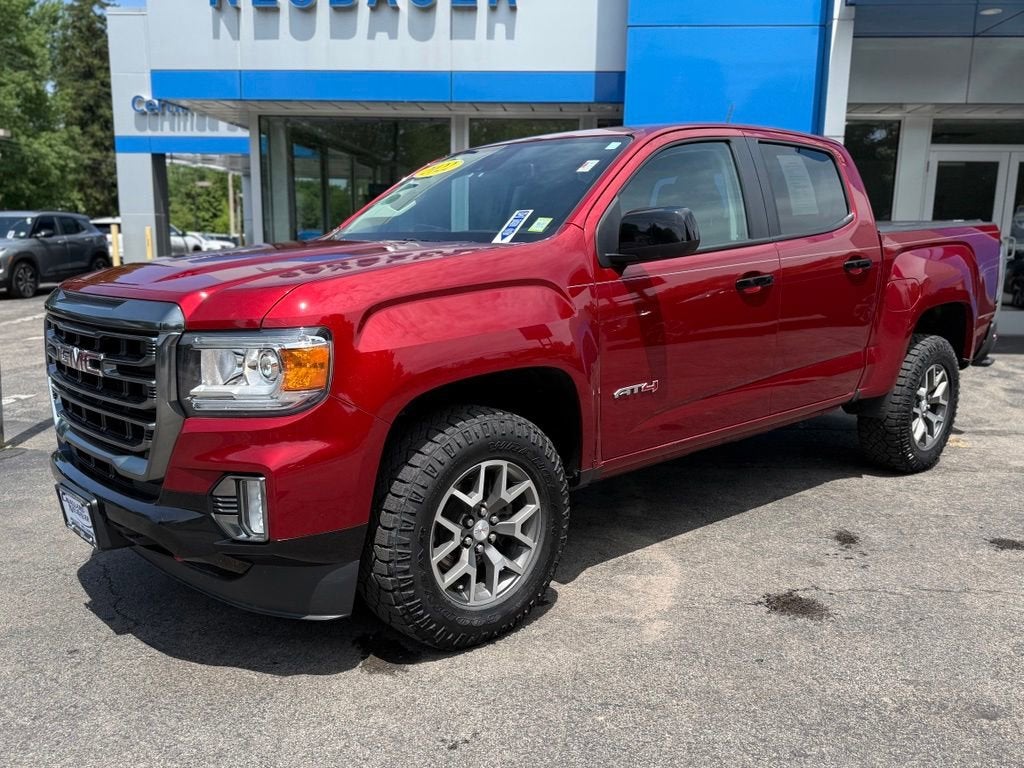 2022 GMC Canyon AT4 - Leather in Cayenne Red Tintcoat — front three-quarter view