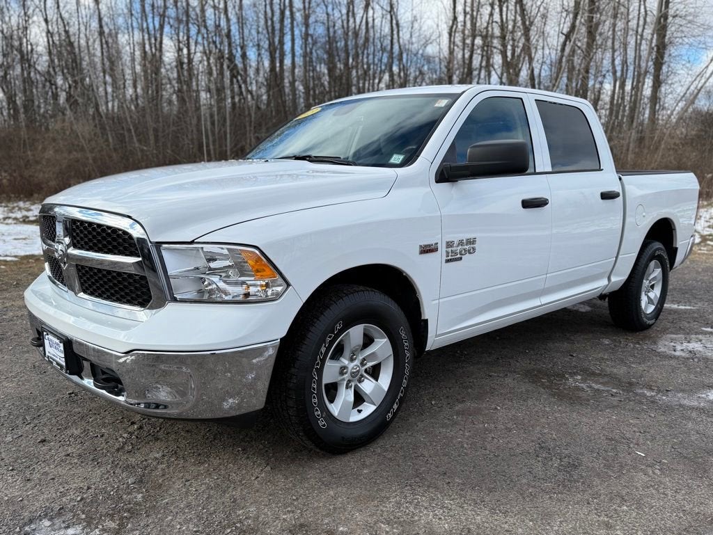 2023 RAM 1500 Classic SLT in Bright White — front three-quarter view