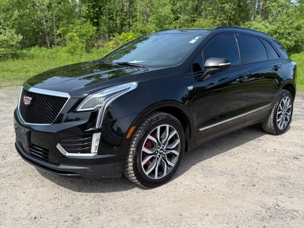 2024 Cadillac XT5 Sport in Stellar Black Metallic — front three-quarter view